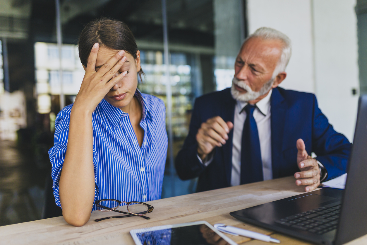 Two business people arguing at the office. RDL Training, how to deal with difficult people.