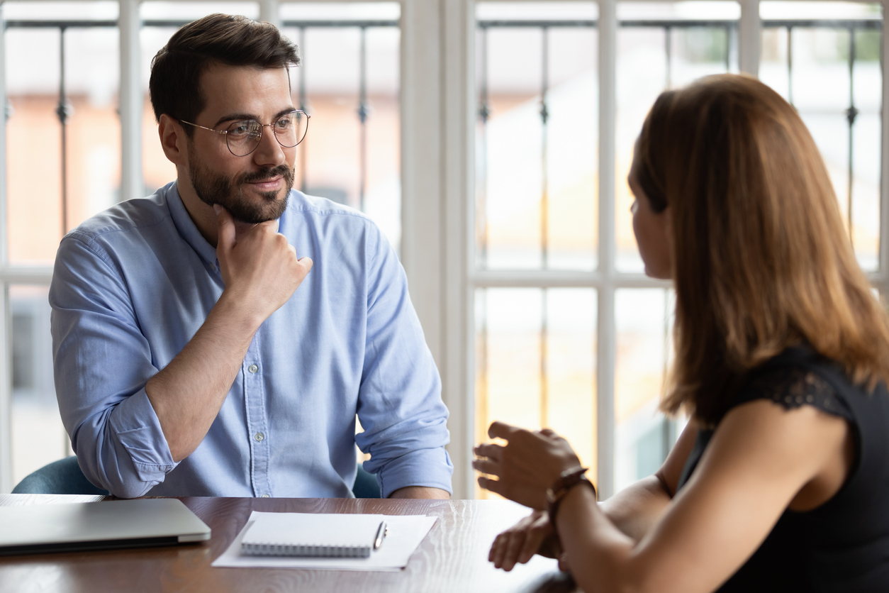 HR manger listening to employee.