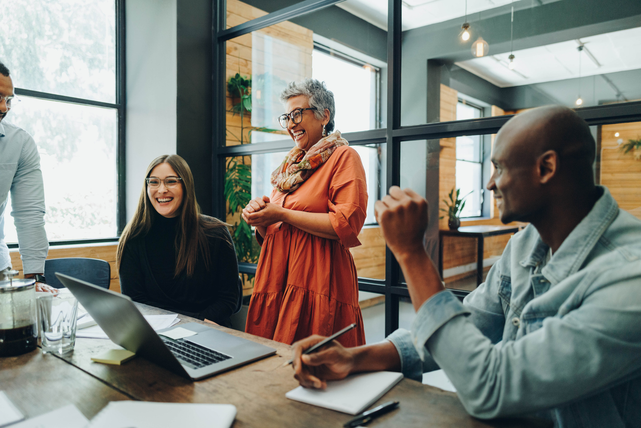 Group of successful businesspeople working as a team in a multicultural workplace.